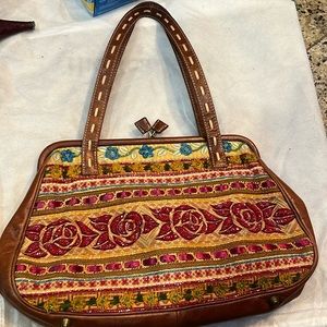 Isabella Fiore beaded bag with brown leather trim.